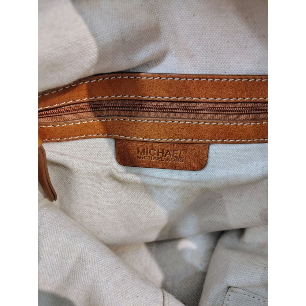 Michael Kors Marina hobo bag features an orange canvas body with braided rope... - Picture 7 of 11